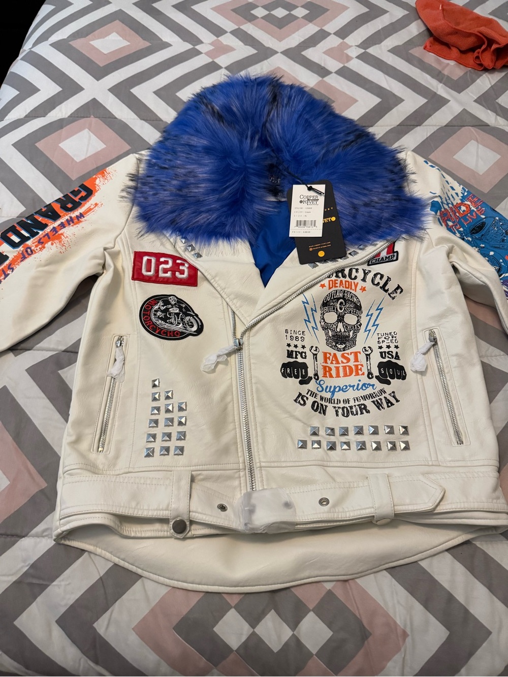 Copper Rivet Leather Motorcycle Jacket with Blue Fur Hood and Graphic Patches